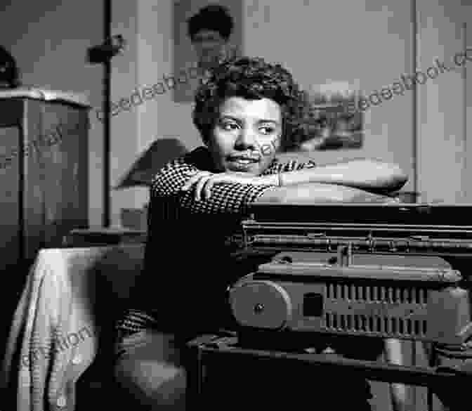 A Black And White Photo Of Lorraine Hansberry, A Young Woman With A Determined Expression, Wearing A Dark Dress And Sitting At A Typewriter. B MORE CAREFUL Lorraine Hansberry