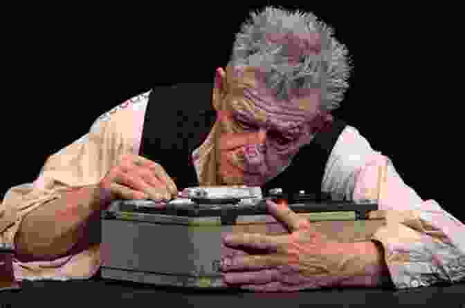 A Photograph Of Krapp, An Elderly Man, Sitting At A Table With A Tape Recorder. Les Blancs: The Collected Last Plays: The Drinking Gourd/What Use Are Flowers?