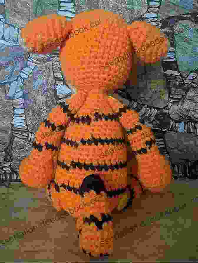 Close Up Of Crocheted Amigurumi Versions Of Winnie The Pooh, Tigger, And Eeyore, Showcasing Their Intricate Details And Expressive Features. The Disney Crochet Book: Crochet Your Favorite Disney Characters With Instructions