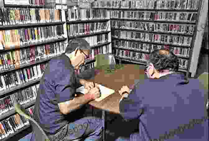 Eric Hobbs Interacting With Inmates In A Prison Library, Guiding Them With Warmth And Encouragement The Librarian: 1 3 Eric Hobbs