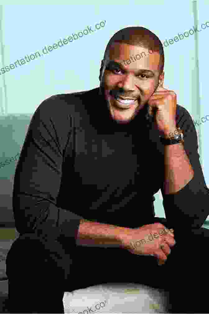 Tyler Perry Smiling And Wearing A Suit TYLER PERRY THE BILLIONAIRE: SIGNIFICANT WORKS AWARDS AND ACHIEVEMENTS